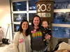 Girls on the Run representatives Kennis Brady (middle) and Shaina Seidner (left) mingled with Valley residents Tuesday, Jan. 21 with Seidner’s infant daughter Tahal (right). Jacob Mann/Fronti