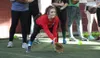 Houston High School softball player Jenni Peterson fields a ground ball during a clinic hosted by the Interior Baseball Lions at the Menard Center Thursday in Wasilla. Jeremiah Bartz/Frontier
