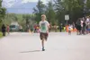 Alex Cadieux runs down the final stretch of the Why Not Tri Triathlon at Wasilla High School Saturday afternoon. ROBERT DeBERRY/Frontiersman.com