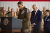 Army Major General Commanding General Brian Eifler of the 11th Airborne Division and Deputy Commander of the Alaskan Command leads a moment of silence with President Joe Biden and Aerospace M