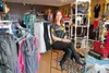 In-fu-sion Boutique owner Ruth Villanueva sits inside her new location in Wasilla. ROBERT DeBERRY/Frontiersman.com