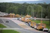 Traffic backs up from the intersection of Trunk and Bogard roads through the new roundabout Thursday afternoon. The heavy traffic was caused by the end of school at Colony Middle and Colony H