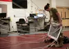 Alaska Air National Guard Staff Sgt. Mel Romero, 176th Operations Support Squadron aircrew flight equipment technician, inspects a parachute at Joint Base Elmendorf-Richardson, Alaska, Nov. 1