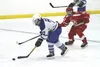Palmer defenseman Miller Armstrong tries to keep the puck away from Wasilla forward Porter Schachle during Wasilla's win over the Moose last week. Fourth-seeded Palmer opens the North Star Co