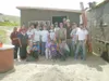 Courtesy photo A group from Church on the Rock poses with a
family in Mexico, at left, in front of a new home the group built
over spring break. The locals are, from left, back row: Rachael
D