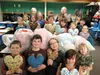 Several members of Iditaquilters Guild of Willow recently joined Suzanne Bounds and her fourth- and fifth-grade class at Willow Elementary School to make 115 heart-shaped pillows for Reach Fo
