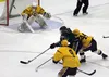 Colony senior Jake Hessinger cuts through a pair of defenseman before putting a shot on goal during a 2-1 loss to Dimond in the ASAA First National Cup Division I semifinals Friday at the Men