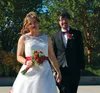 Halee and Berick Cook enter the Palmer fairgrounds from the Green Gate on Suday, Aug. 28, shortly after their wedding on the borough green in downtown Palmer. CAITLIN SKVORC/Frontiersman.com