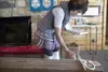Director for the Palmer Museum of History and Art, Melissa
Jenski works on assembling a koto for Sunday's Saroma Festival. The
festival was planned to celebrate the 30th anniversary of Palmer