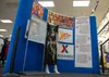 An information display showcases the rich heritage of all Asian Americans and Pacific Islanders, and displays a baro’t-saya, a national Fillipino handsewn dress made from piña fabric made fro