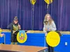 PJMS teacher and spelling bee coordinator Linda Klapperich, left, and eighth-grade student Ashlyn Wilson, right. Wilson was the overall winner. Courtesy photo