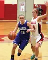 Palmer guard Katie Bowman tries to move past Wasilla's Amanda Hutchins during a 43-23 loss to the Warriors Feb. 25, 2014, at Wasilla High School. Bowman is one of a number of veterans on Palm