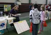 Jeremiah and Trinity Forro play 'Weather Jeopardy' with meteorologist Louise Fode during the 2016 Mat-Su Emergency Preparedness Expo at the Menard Center. Frontiersman file photo