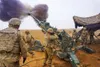 Soldiers assigned to the Field Artillery Squadron, 3rd Cavalry Regiment, fire their M777 howitzer on Firebase Saham, Iraq, Dec. 3, 2018. Leaders from the regiment spoke about the unit's nine-