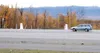 GREG JOHNSON/Frontiersman Owners of a proposed Chili’s
restaurant want to share this access, marked by the white pylons,
off the Parks Highway with the Grand View Inn and Suites. Wasilla
Plan