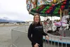 Alaska Raceway Park owner and race director Michelle Lackey Maynor stand in front of carnival rides operated by A-1 Midway. Frontiersman file photo.