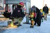 Three-year-old trick or treater Caspian Robins talks to Palmer Fire and Rescue Captain Richard Washer at Palmer Chamber's Trick or Treat in the Street event Oct. 30, 2021. The 2022 event is F