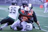 Colony's Julian McPhail, Tyde Riopelle and Jake Hessinger bring down West running back Savon Bell during a 46-15 win over the Eagles Aug. 31 in Anchorage. Jeremiah Bartz/Frontiersman