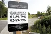 A Usibelli Coal Mine Inc. sign with permitting numbers stands at the entrance access point to the Wishbone Hill area near Sutton. Frontiersman file photo