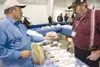 ROBERT DeBERRY/Frontiersman Robert Garrabrant, left, and Bob
Wiseman talk ammunition at the Alaska Gun Collectors Association
fall gun show Saturday afternoon at the Alaska State Fairgrounds.