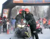 The Tesoro Irondog race team of Wasilla resident Tim Burns,
left, and Palmer's Rick Fleming have a last minute discussion
Sunday before being the first team to start the 1,971 mile
snowmachin