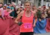 Christy Marvin sprints the final stretch en route to her win in the women's class of the 2016 Mount Marathon Monday, July 4, 2016, in Seward. The Palmer woman finished the storied race up and