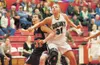 Colony's Saige Stefanski boxes out Kenai's Nicole Tieaskie during the Northern Lights Conference Championships in March. Stefanski is one of 12 Valley players slated to compete in the AABC Se