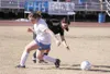 Palmer freshman Rebekah Youngblood and Houston senior Paige Wagner battle for the ball during Palmer's 7-1 win over the Hawks at Machetanz Field on Tuesday. JEREMIAH BARTZ/Frontiersman