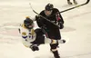 Houston's Reed Humphreys collides with a Monroe player during a 3-1 win over the Rams Saturday at the Big Lake Rec Center. Courtesy of Brian Geerdes