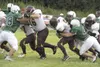 JEREMIAH BARTZ/Frontiersman Dimond’s Damon Griffith runs for a
gain against Colony last Saturday. Dimond moved into the Alaska
Sports Broadcasting Network top 5 this week after a win over the