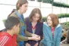 VICTORIA NAEGELE/Alaska Ag in the Classroom Marie Domer of Domer
Family Farms shows middle school students from Angoon and Colony
how she starts plants in her greenhouse as part of a cultural