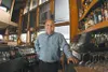 Chuck Spinelli, builder of fine homes, stands behind the bar of
one of his newest acquisitions, the Settlers Bay Lodge on
Knik-Goose Bay Road. BOB MARTINSON/Frontiersman