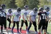 Redington quarterback Jacob Pike lines up behind linemen Lucas Kirn, Timmy Toston, Kyler Rumfelt and Riley Peterson during a scrimmage against Houston Aug. 22. Redington, the Valley's newest 