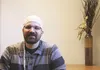 Certified substitute teacher and Anchorage Adult Baseball League player Jeremy Wedge reveals his Novocure cap, a piece of gauze covering four insulated transducer arrays connected to a sort o