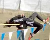 Houston senior Danielle Barney skims the high jump pole during
Friday's high jump competition at the Palmer Relays. (ROBERT
DeBERRY/Frontiersman)