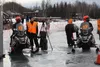 Allen Hill and Marc McKenna — Team 17 — are last to leave the chute at the 2015 Iron Dog race restart in Big Lake Feb. 22. HEATHER A. RESZ/Frontiersman