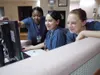 Air Force Staff Sgt. CaTeah Bryant, medical technician, Air Force Capt. Omayra Nunez, charge nurse, and Air Force 1st Lt. Erin Kukay, charge nurse, all of the 673d Medical Group Perinatal Ser