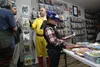Jacob Eichhorn reads a comic book during Halloween Comic Fest at Aegis Comics in Wasilla. Jacob Mann/Frontiersman