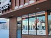 Electronic cigarettes are promoted on Dec. 21 in the windows of a specialty store in Midtown Anchorage. A new state report shows that teen use of e-cigarettes, also called vapes, has risen dr