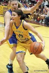 Colony senior Ashley Turcotte tries to drive the ball past Wasilla senior Cassidy Edwards during the Alaska Association of Basketball Coaches 3A/4A Girls Senior All-Star Game at Dimond High S