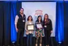 Stephany Pippin, a public affairs specialist assigned to the 11th Air Force Public Affairs Office, second from left, poses with members of the Alaska Young Professionals on Thursday, April 4t