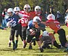 MTA's Justin Hunt runs to complete the two-point conversion
following a touchdown in Saturday's game against Valley Rental.
Photo courtesy of DOROTHY JACOBSON