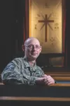 Air Force Master Sgt. Steven James, 673d Air Base Wing superintendent of chapel operations, sits in a pew at the Heritage Chapel on Joint Base Elmendorf-Richardson, Alaska, Dec. 12, 2017. Jam