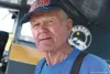 Joe Stanger stands in front of his Gull Wing Stinson at the Willow Airport July 23. The Gull Wing is one of several classic planes owned by local pilots that will be part of the Centennial Ce