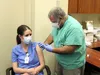 Alaska Chief Medical Officer Dr. Anne Zink was given the COVID-19 vaccine by Dr. Michael Alter Friday at Mat-Su Regional Medical Center. Tim Rockey/Frontiersman