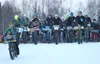 Cyclists take off down the first hill from the starting line of the Susitna 100 at Happy Trails Kennel in Big Lake on Saturday, Feb. 12. Cyclists are now gearing up for the Talkeetna Trio, a 