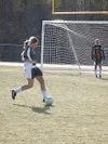 Colony sophomore Ellie Monroe boots the ball away from a Palmer
player during the second half of the Knights' 2-1 win over the
Moose at Colony High School on Tuesday.JEREMIAH BARTZ/
Frontiers