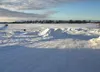 Although the current owners of the Big Lake Lodge have gated the
access point to the Big Lake ice road, people are driving around
the gate to get onto the lake. BOB MARTINSON/Frontiersman