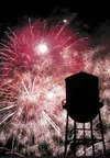The Palmer water tower is silhoutted against an explosion of
fireworks during the Country Cuts fireworks show in downtown Palmer
Saturday night. (ROBERT DeBERRY/Frontiersman) Robert DeBerry