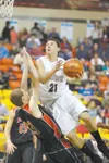 Wasilla High graduate Cody Pfeifer goes up for two points during
first round competition at the 2010 First National Bank/ASAA 4A
State Basketball Championship Tournament. ROBERT DeBERRY/
Fron